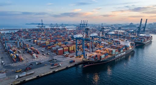 Global shipping port at dawn